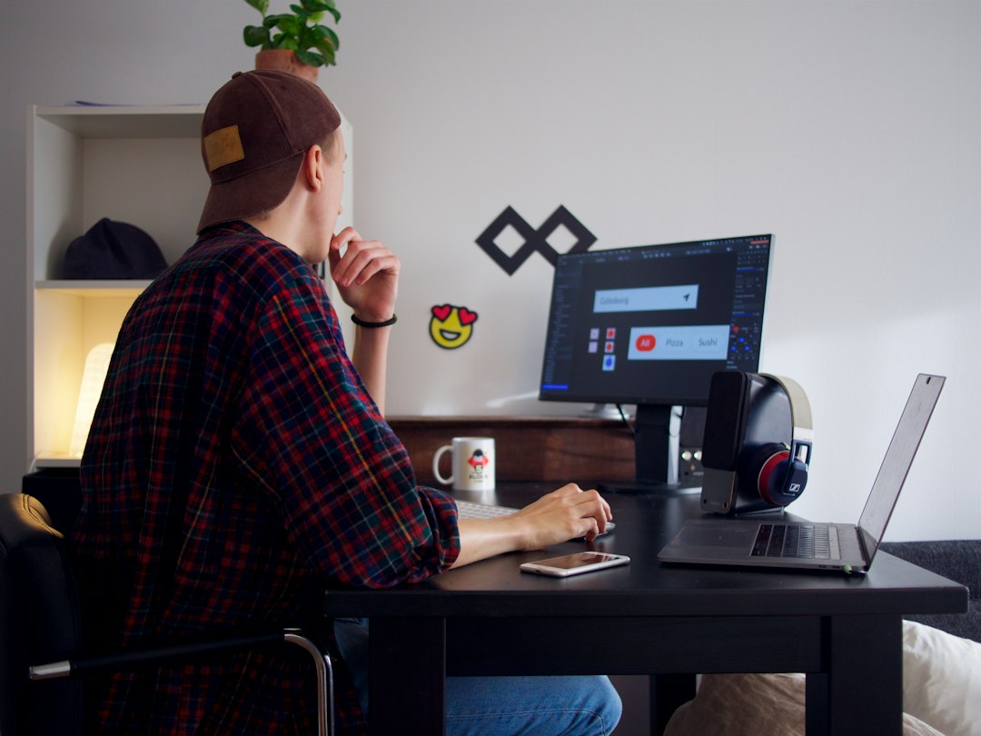 This is me, in my small minimalistic freelancing office.
Monitor: Eizo FlexScan EV2450 
Speakers: Creative GigaWorks T20