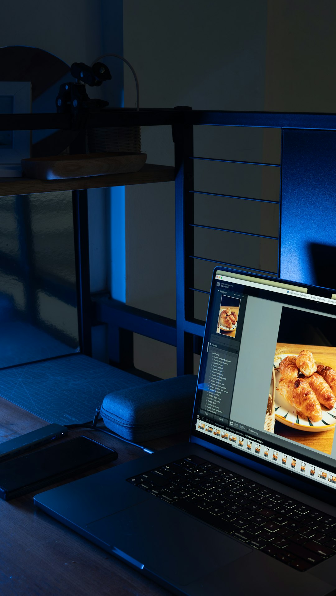 A balanced and inviting workspace featuring a laptop with coding interface under warm lighting. Represents professional productivity, remote work flexibility, and the human side of technology